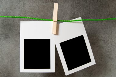 Designer concept - blank photo frames for your photos clipart