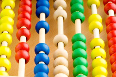 Education concept - Abacus with many colorful beads