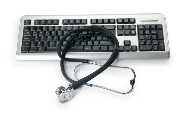 Estetoscopio y teclado que ilustran el concepto de seguridad digital — Foto de Stock