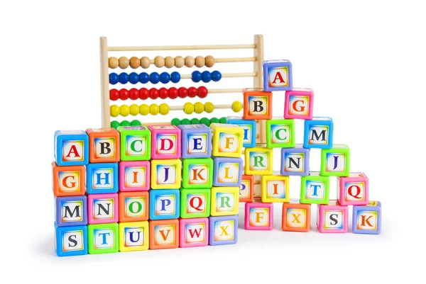Ábécé blokkok és elszigetelt fehér abacus — Stock Fotó