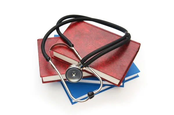 Concetto di educazione medica con libro e stetoscopio — Foto Stock
