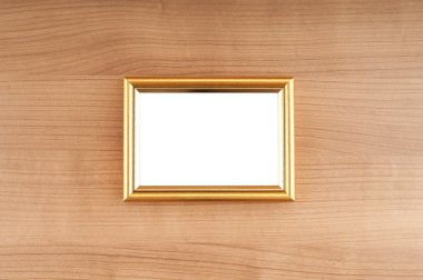 Picture frames on the polished wooden background clipart