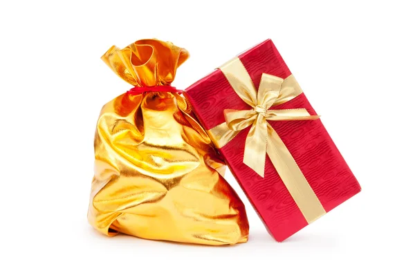 Gift boxes and golden sacks — Stock Photo, Image