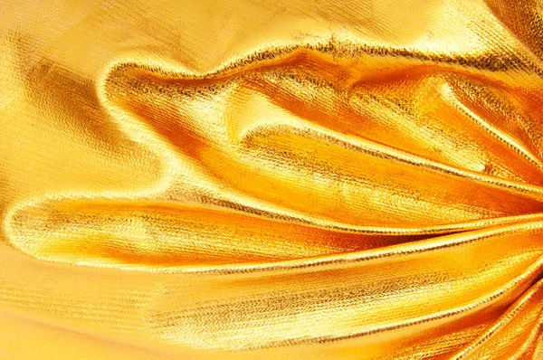 Superficie lucida del riflettore foto oro — Foto Stock