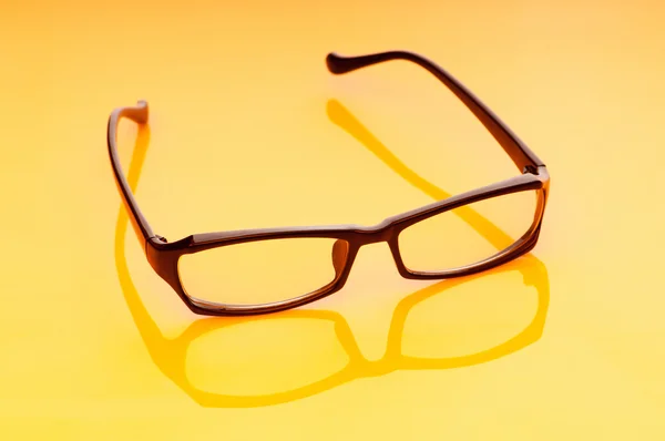 Optische leesbril op de achtergrond — Stockfoto