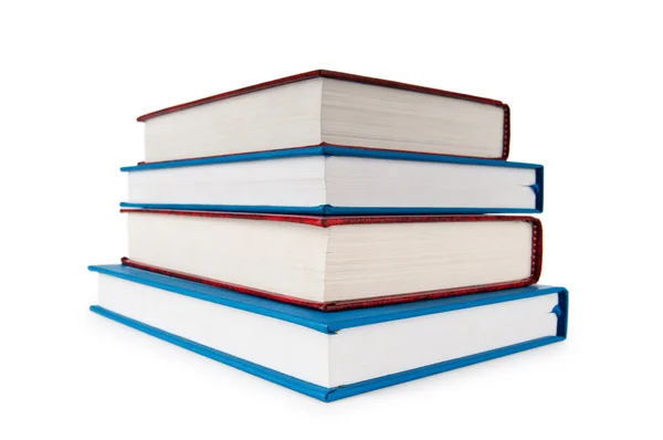 Stack av böcker isolerade på den vita bakgrunden — Stockfoto