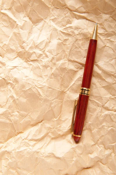 Paper background with pen — Stockfoto