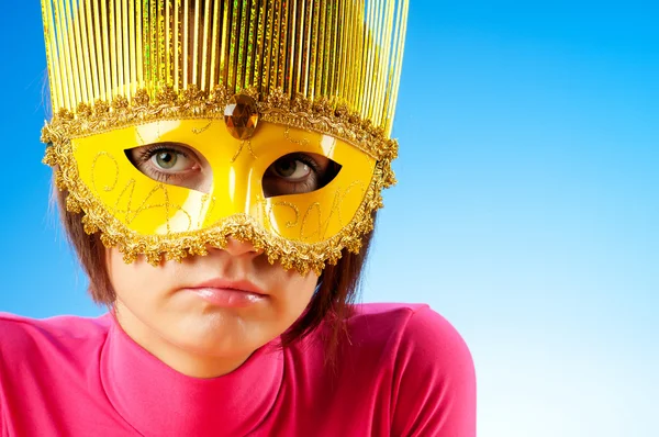 Attractive woman posing in the stylish mask — Stock Photo, Image