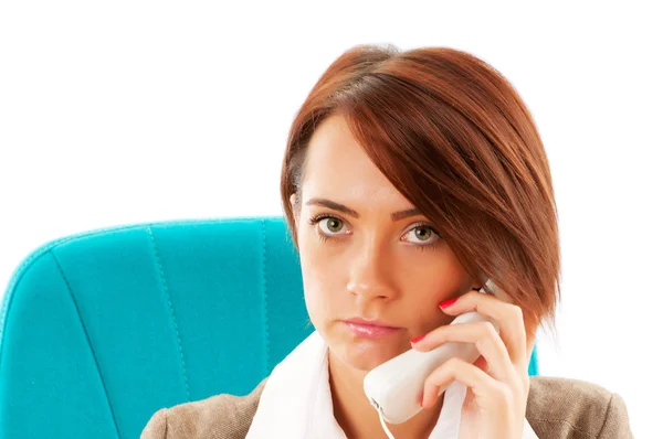 Young businesswoman talking on the phone Stock Picture