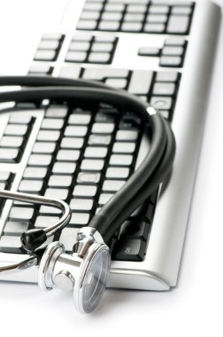 Stethoscope and keyboard illustrating concept of digital securit clipart