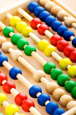 Education concept - Abacus with many colorful beads