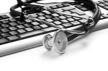 Stethoscope and keyboard illustrating concept of digital securit clipart