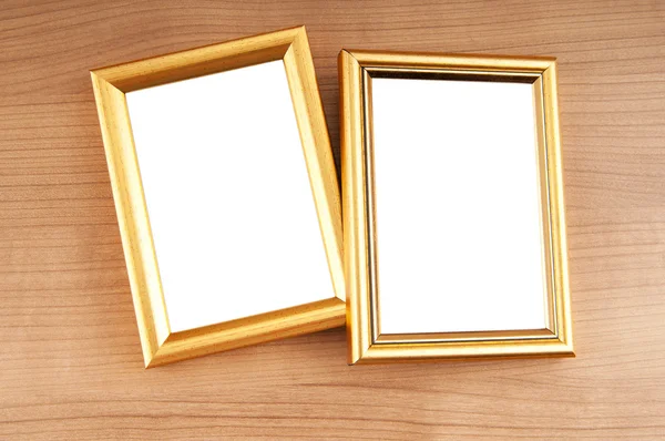 Foto frames op de gepolijste houten achtergrond — Stockfoto