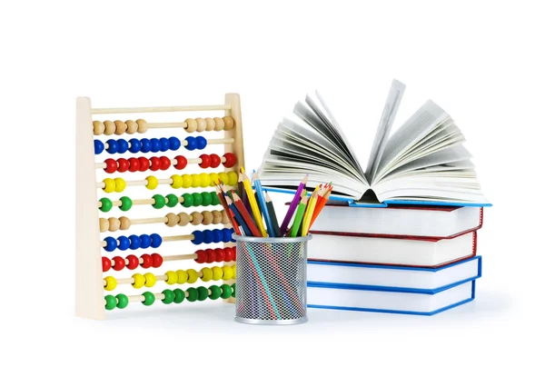 Concepto educativo con lápices, libros y ábaco —  Fotos de Stock