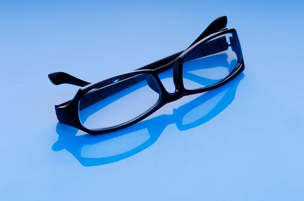 Okulary do czytania optyczne na tle — Zdjęcie stockowe