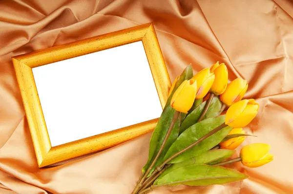 Picture frames and tulips flowers on satin — Stock Photo, Image
