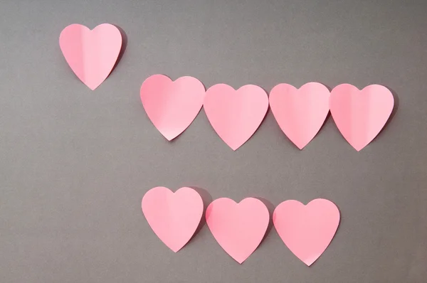 Karteczki na tle w kształcie serca — Zdjęcie stockowe