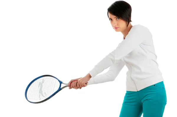 Молодая девушка с теннисной ракеткой и бал изолированы на белом — стоковое фото