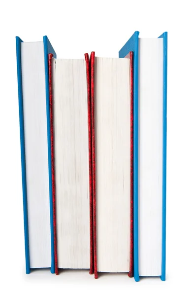 Стопка книг, изолированных на белом фоне — стоковое фото