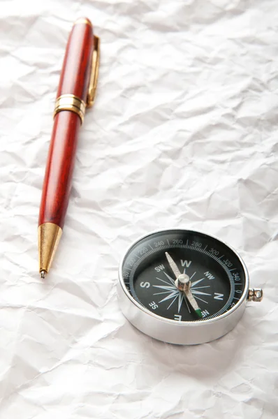 Vintage compass on the paper in adventure concept — Stok fotoğraf