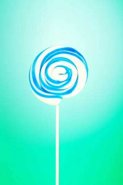 Färgglada lollipop mot bakgrund — Stockfoto