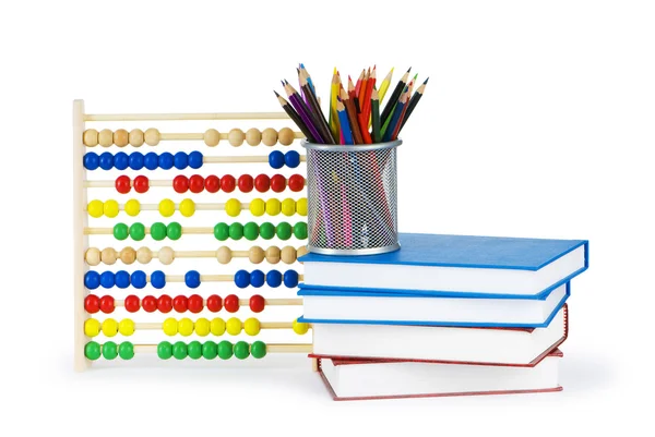 Concepto educativo con lápices, libros y ábaco —  Fotos de Stock