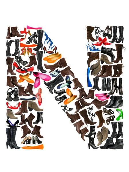 Lettertype gemaakt van honderden schoenen - alfabet n — Stockfoto