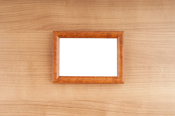 Picture frames on the polished wooden background — Stock Photo, Image