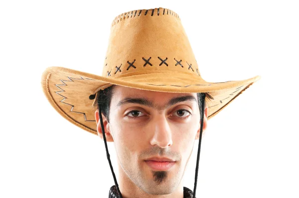 Mladý muž nosí kovbojský klobouk na bílém pozadí — Stock fotografie
