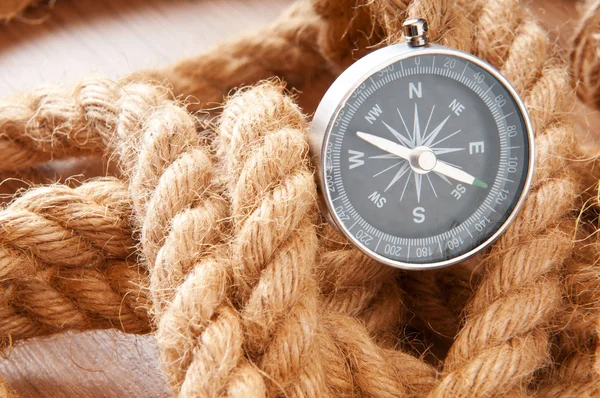 stock image Compass and rope in travel and adventure concept