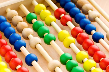 Education concept - Abacus with many colorful beads