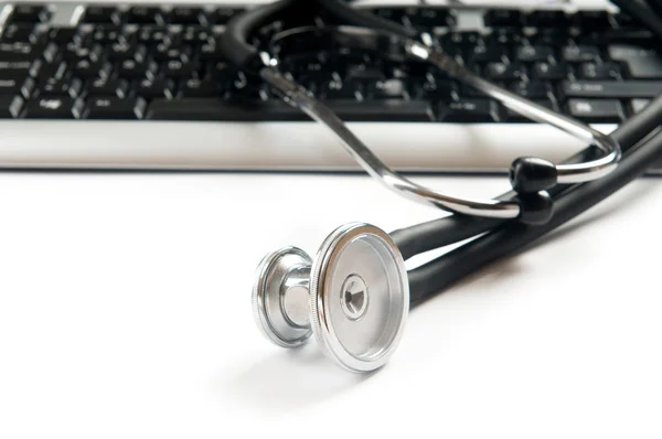 stock image Stethoscope and keyboard illustrating concept of digital securit