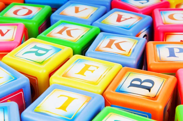 Učení a vzdělávání koncept - hromadu bloků abeceda — Stock fotografie