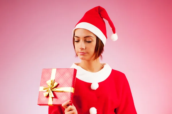 Attractive woman santa with gift box — Stock Photo, Image