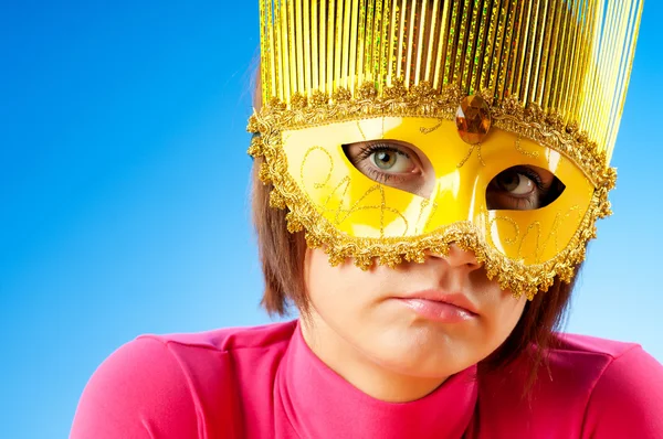 Attractive woman posing in the stylish mask — Stock Photo, Image