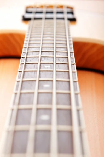 Musical concept with wooden guitar — Stock Photo, Image