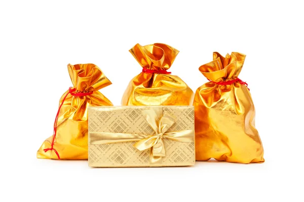 Ajándék dobozok és zsákok arany — Stock Fotó