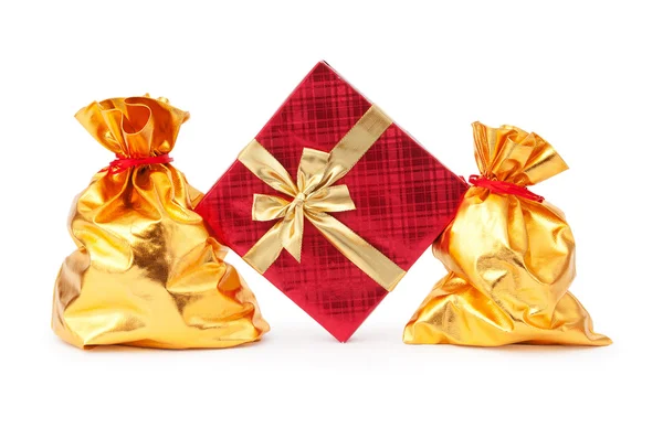 Подарункові коробки та золоті мішки — стокове фото