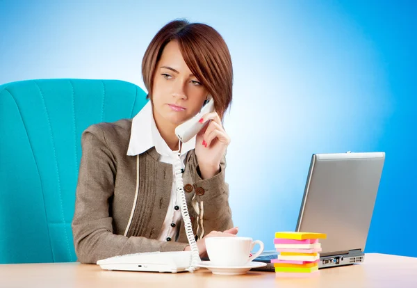 Young business woman working in the office Royalty Free Stock Images