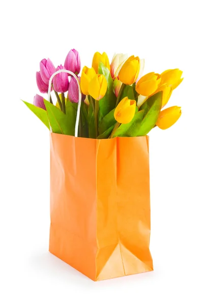 Tulips in shopping bag isolated on white — Stock Photo, Image