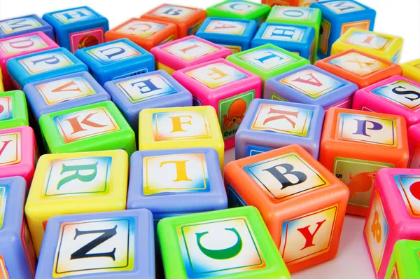 Učení a vzdělávání koncept - hromadu bloků abeceda — Stock fotografie