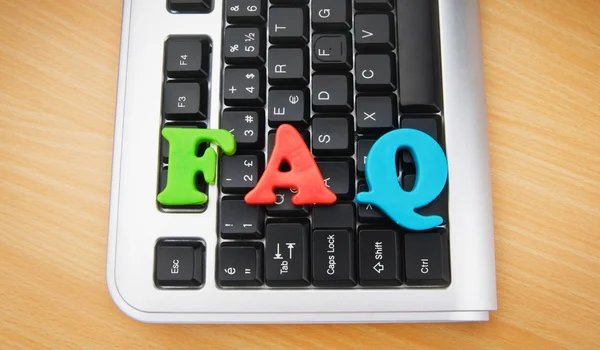 Concepto FAQ con letras en el teclado — Foto de Stock