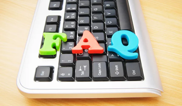 Faq-Konzept mit Buchstaben auf der Tastatur — Stockfoto