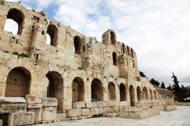 The Odeon of Herodes Atticus is a stone theatre structure located on the south slope of the Acropolis of Athens clipart