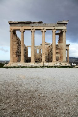 The Erechtheum is an ancient Greek temple on the north side of the Acropolis of Athens in Greece clipart