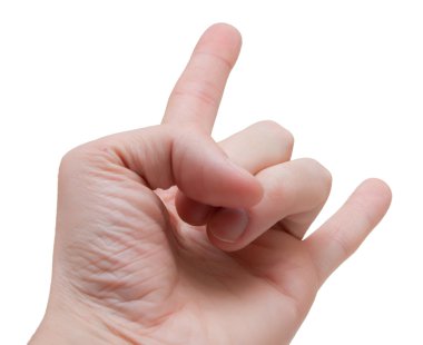 A man's hand giving the Rock and Roll sign. clipart