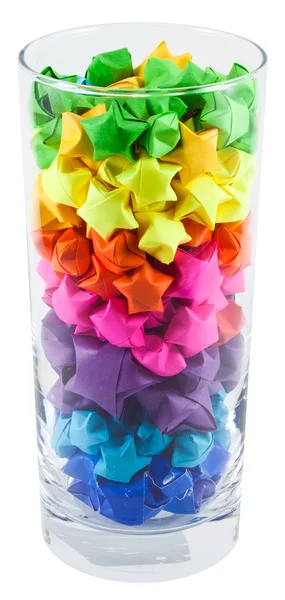 Estrelas multicoloridas em um copo — Fotografia de Stock