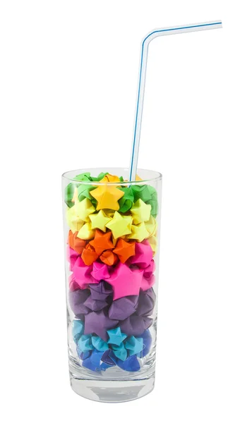 Estrellas multicolores en un vaso sobre un fondo blanco —  Fotos de Stock