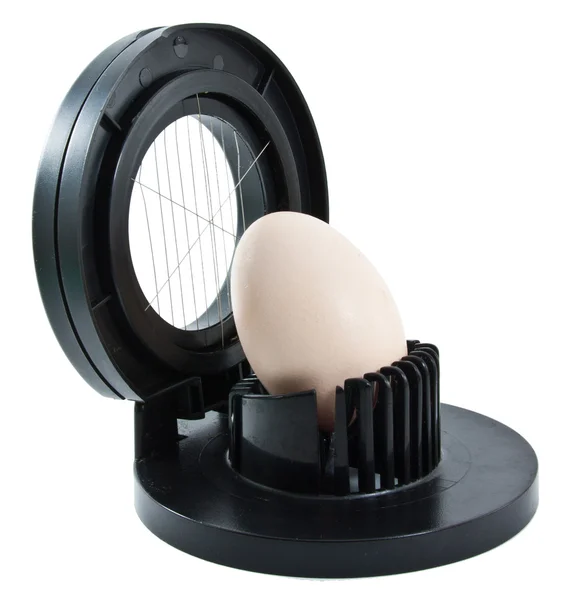 Egg slicer with one egg on a white background — Stock Photo, Image