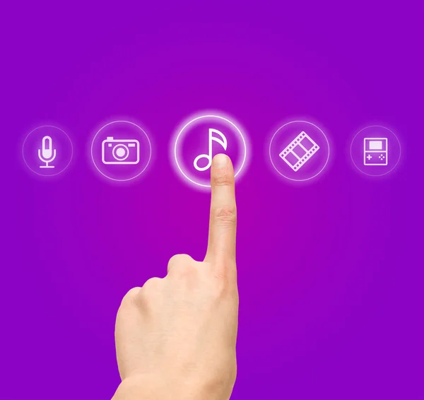 Hand choosing melody-sound film symbol from media icons — Stock Photo, Image